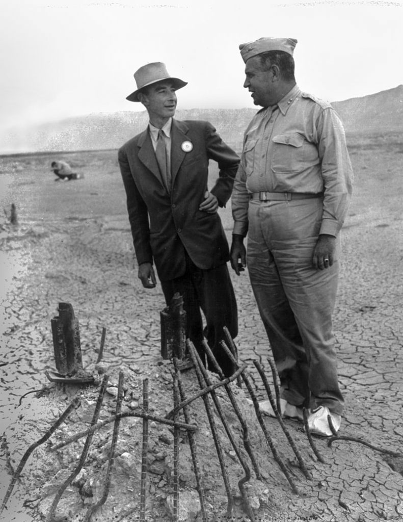J. Robert Oppenheimer and Leslie Groves at remains of the Trinity test in September 1945. Courtesy: TIME