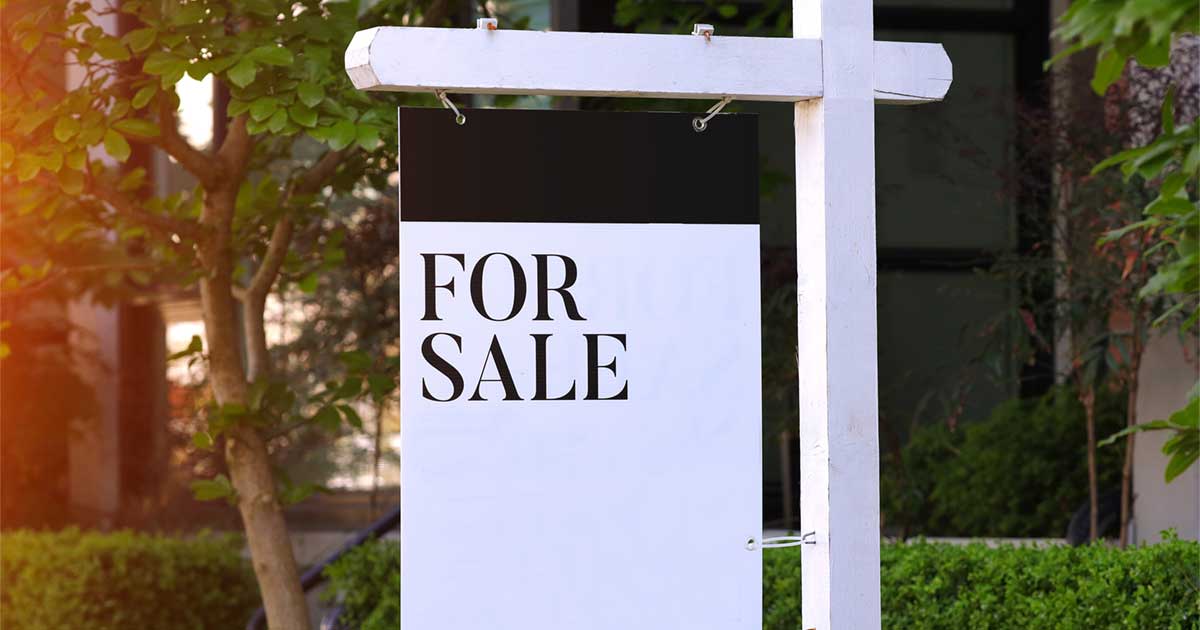 For sale sign outside of potentially contaminated drycleaner property