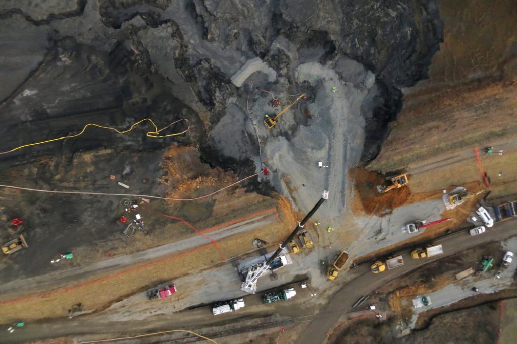 Environmentalists argue rain-proof caps do not provide a solution to coal ash pond collapses like this one that happened along the Dan River in Virginia back in 2014. Courtesy: The Center for Energy, Environment, And Sustainability