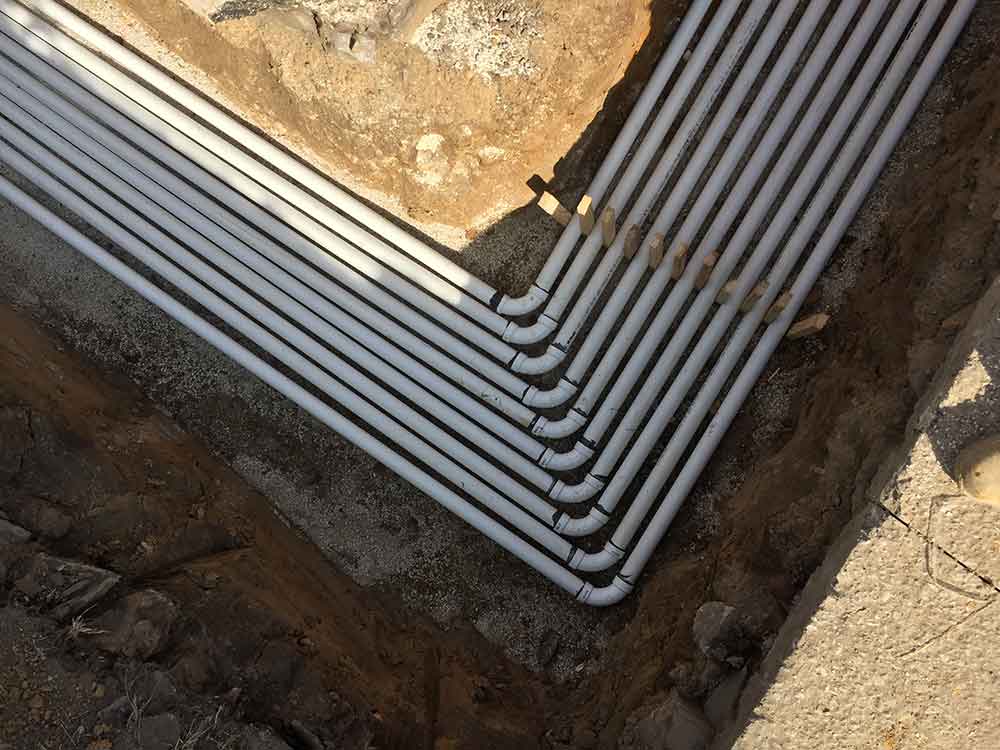 Conduit tubes buried underground for a Soil Vapor Extraction (SVE) System 